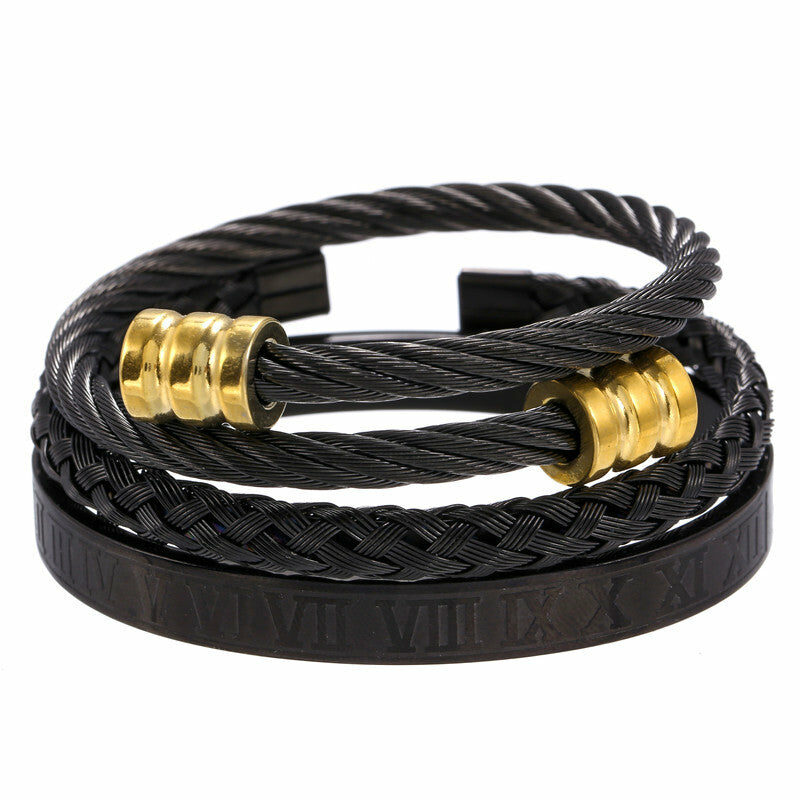 combo de pulseras stainless steel color negro con detalles color oro